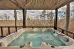 Hot tub located in screened in porch 